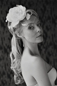 Large Silk and Organza Flower with Leaves and Feeler Feathers and Fly Away Birdcage Veil.