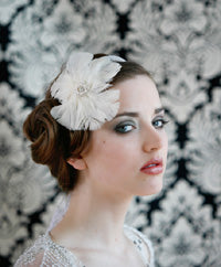 Circular Feather fascinator with vintage style brooch Center